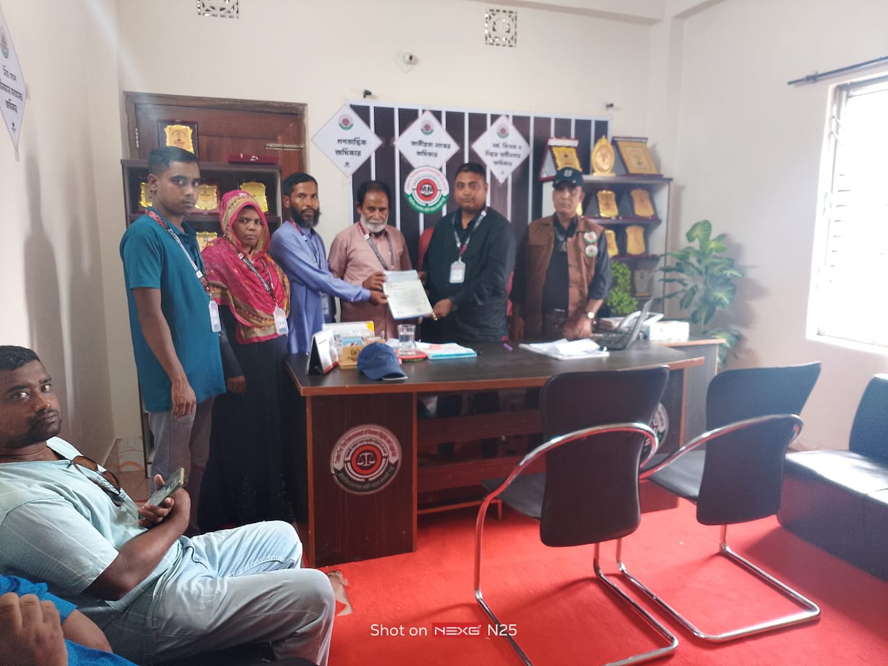 মহাদেবপুর উপজেলা শাখার অনুমোদন দিচ্ছেন মাননীয় চেয়ারম্যান মহোদয়